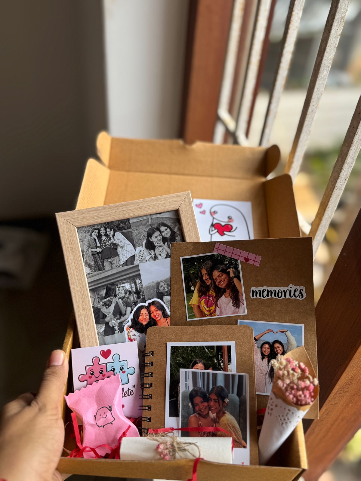 Handcrafted gift box from Calicut with scrapbook and bouquet