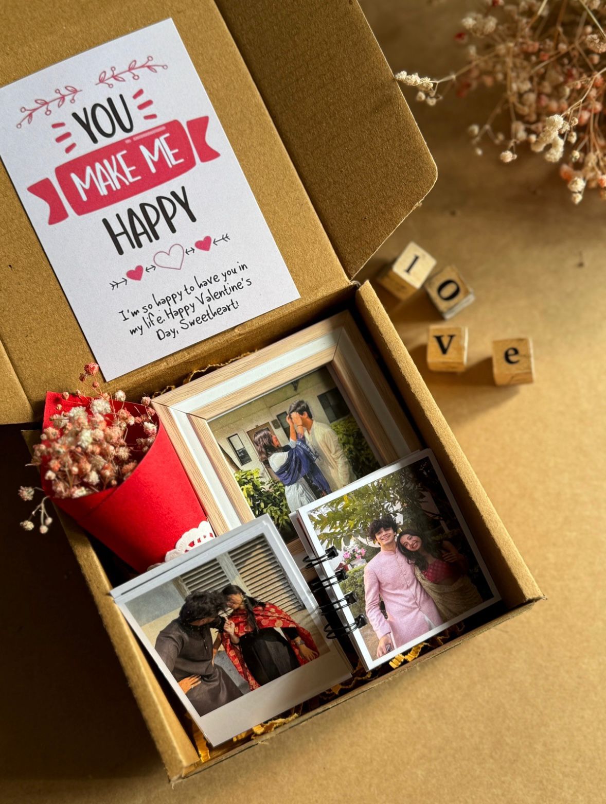 Mini personalized gift hamper with photo book, frame and polaroids
