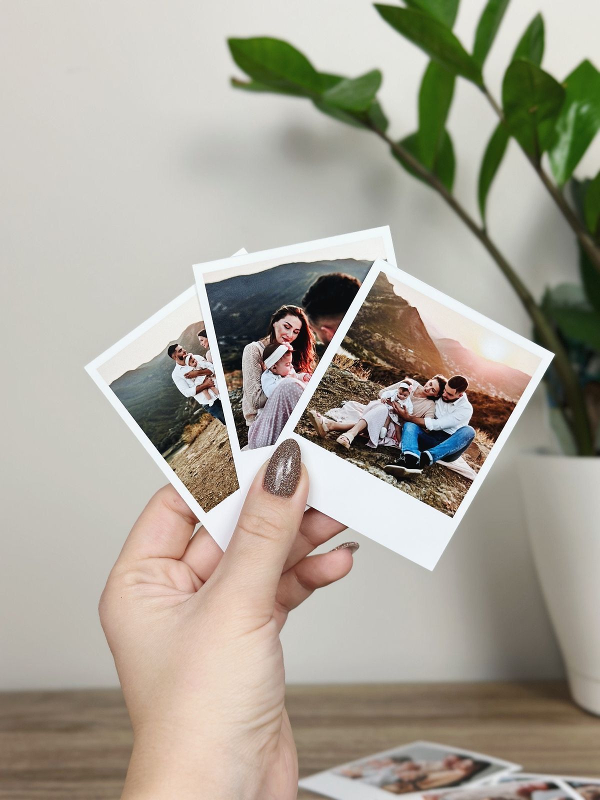 Medium polaroid photo prints (9x7 cm) held in hand, perfect for gifting and keepsakes.